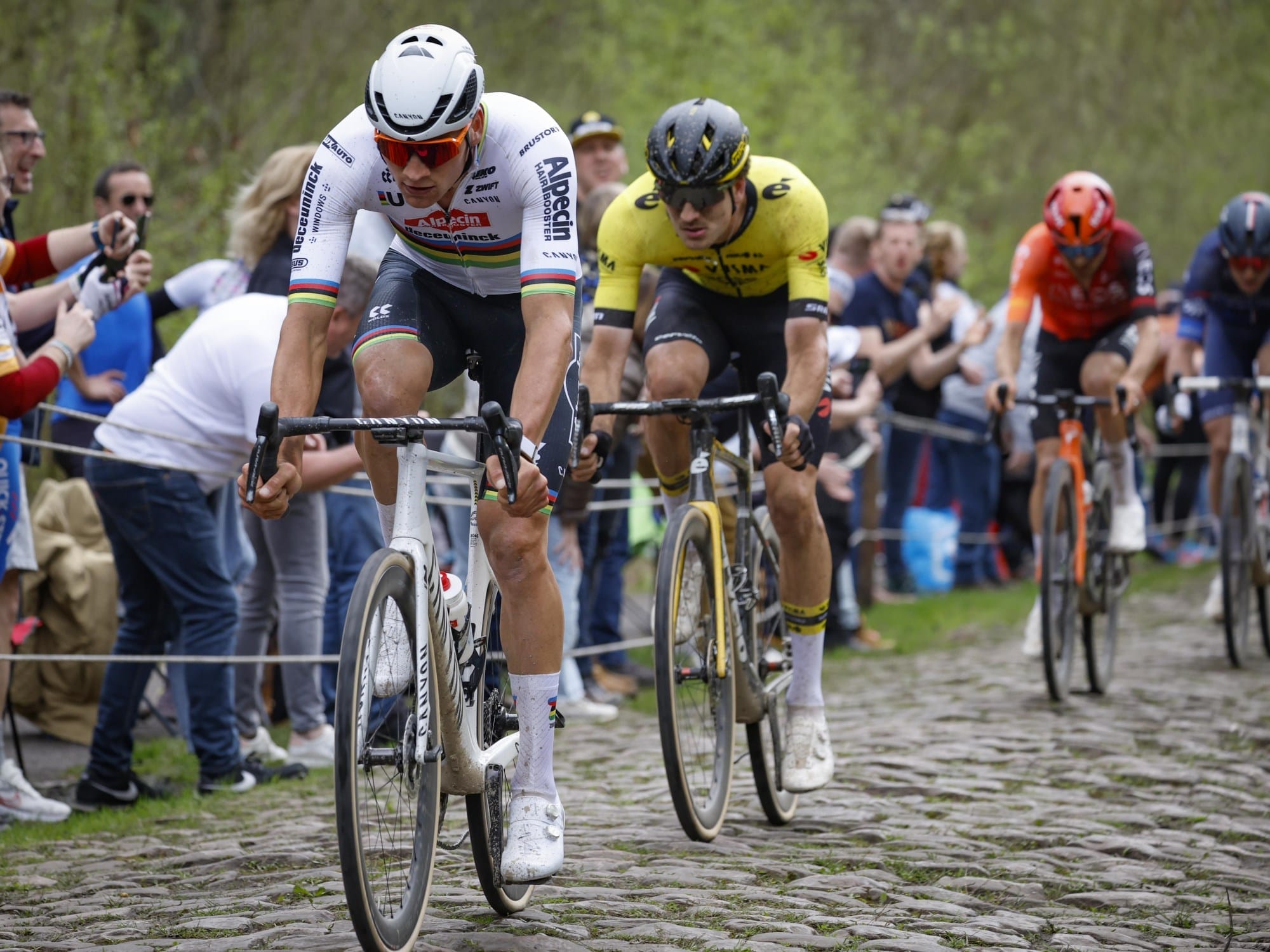 Team Visma | Lease a Bike riders battling through a Spring Classic