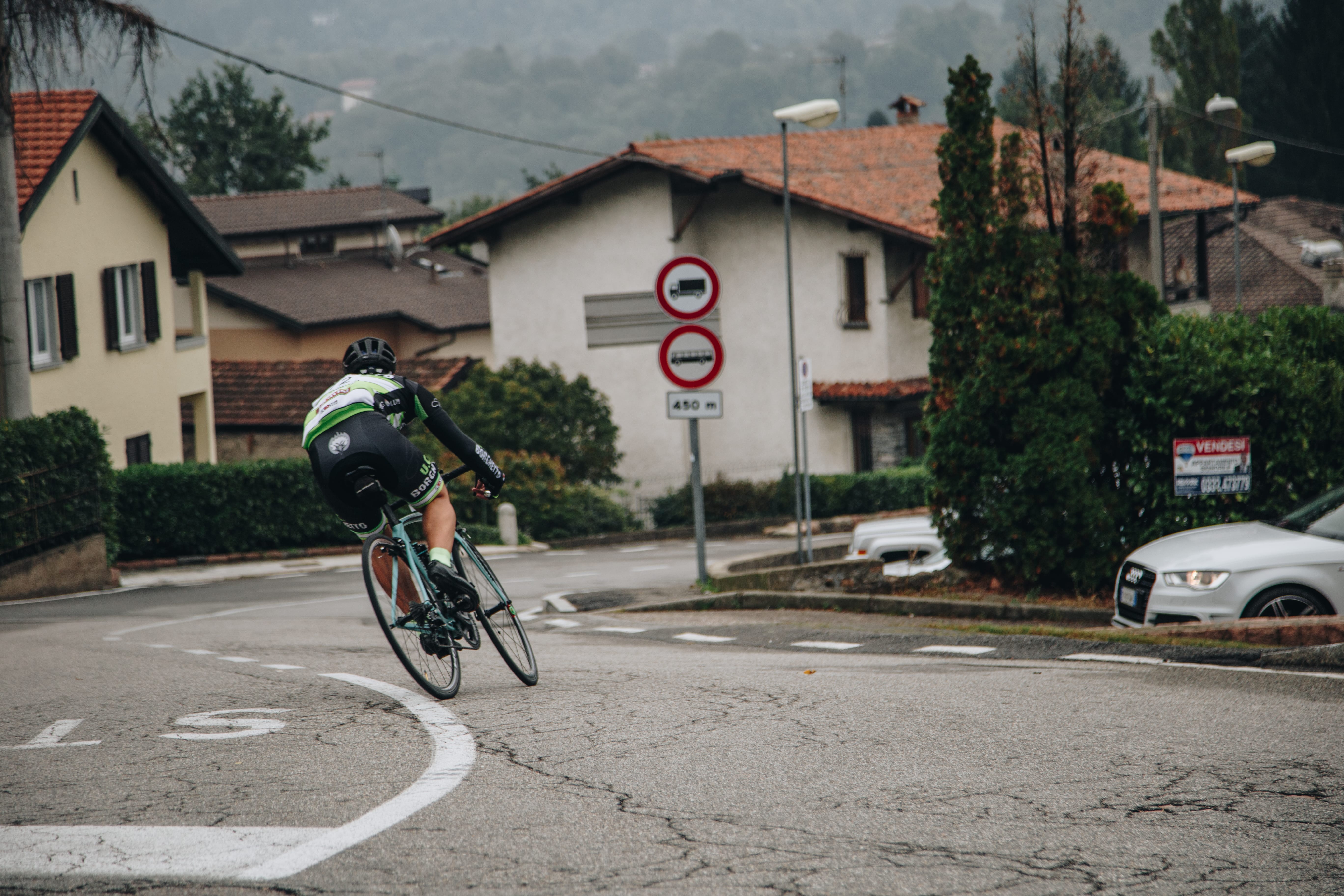 Photo of cyclists negotiating a hairpin bend during training