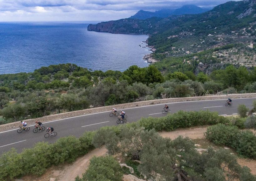 Riders passing through beautiful scenery on the Mallorca 312 2025