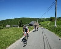 Riders travel through countryside during Liege Bastogne Liege 2025