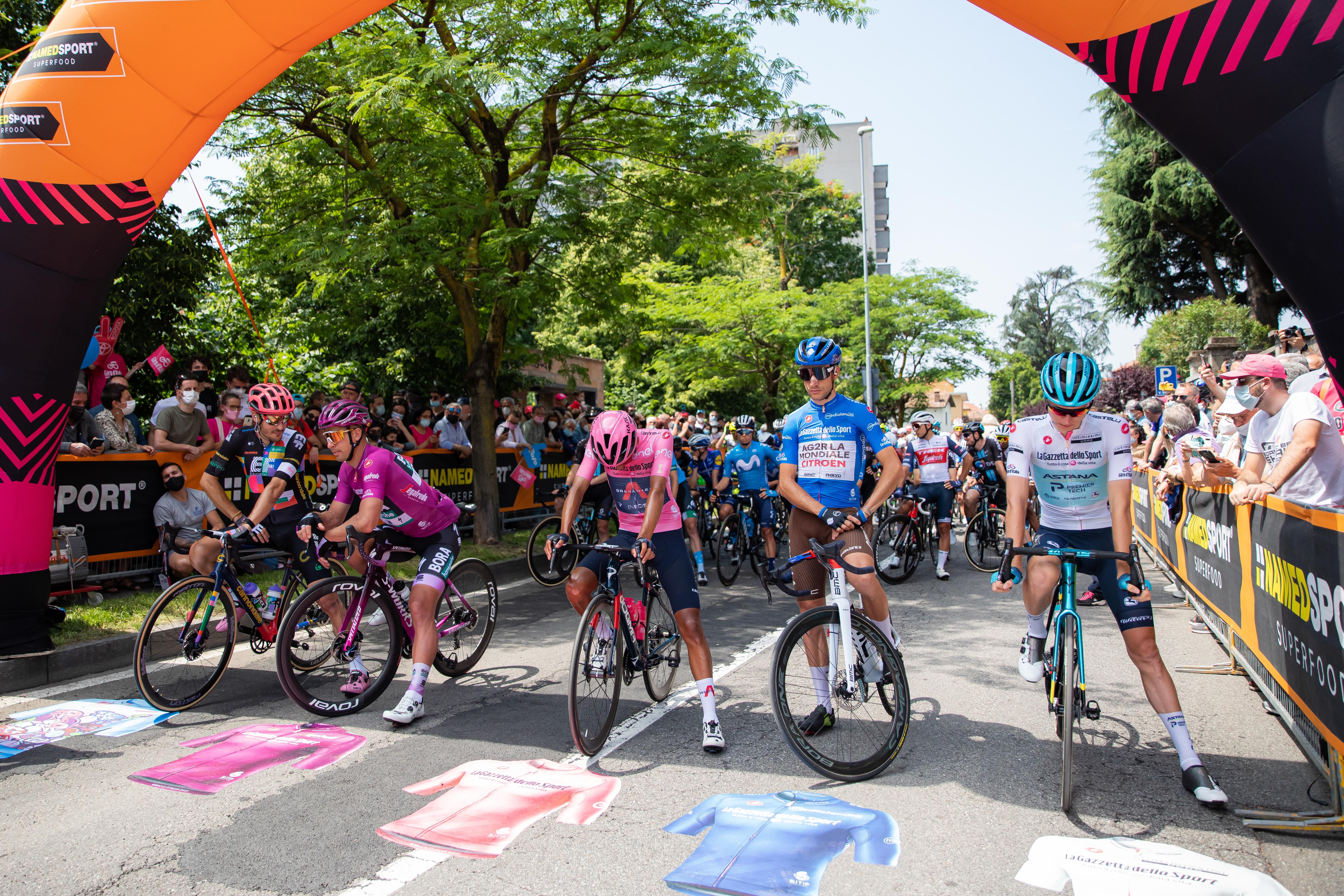 Riders wait at the start line of the Giro d'Italia 2025 route