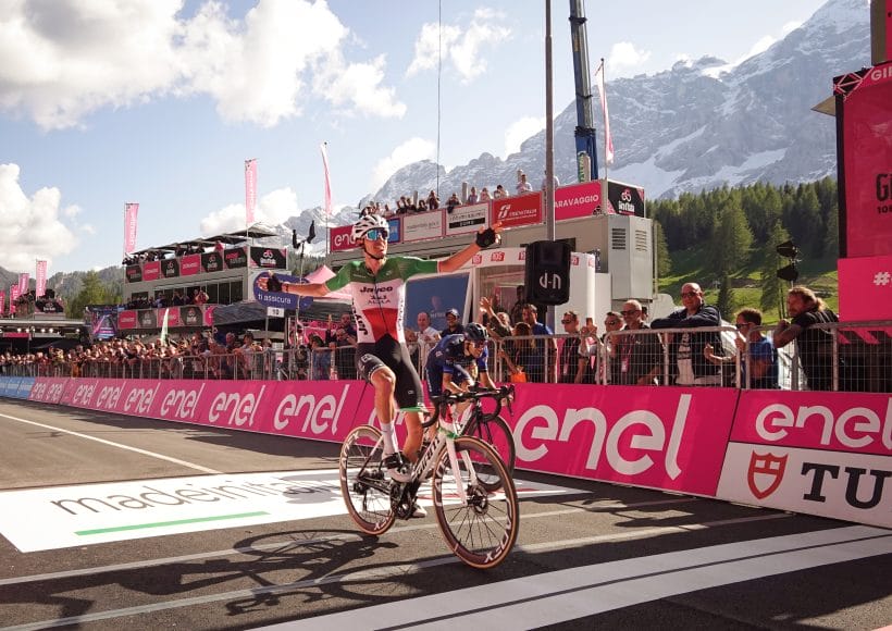 Photo of a cyclist crossing the finish line at the Giro d'Italia