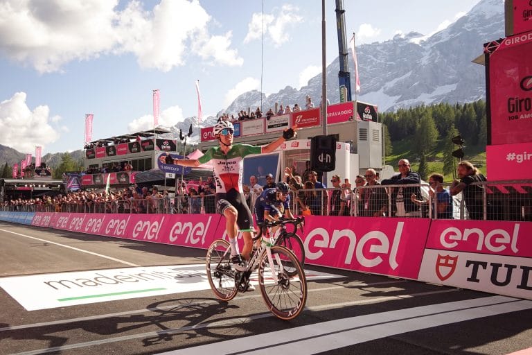 Photo of a cyclist crossing the finish line at the Giro d'Italia