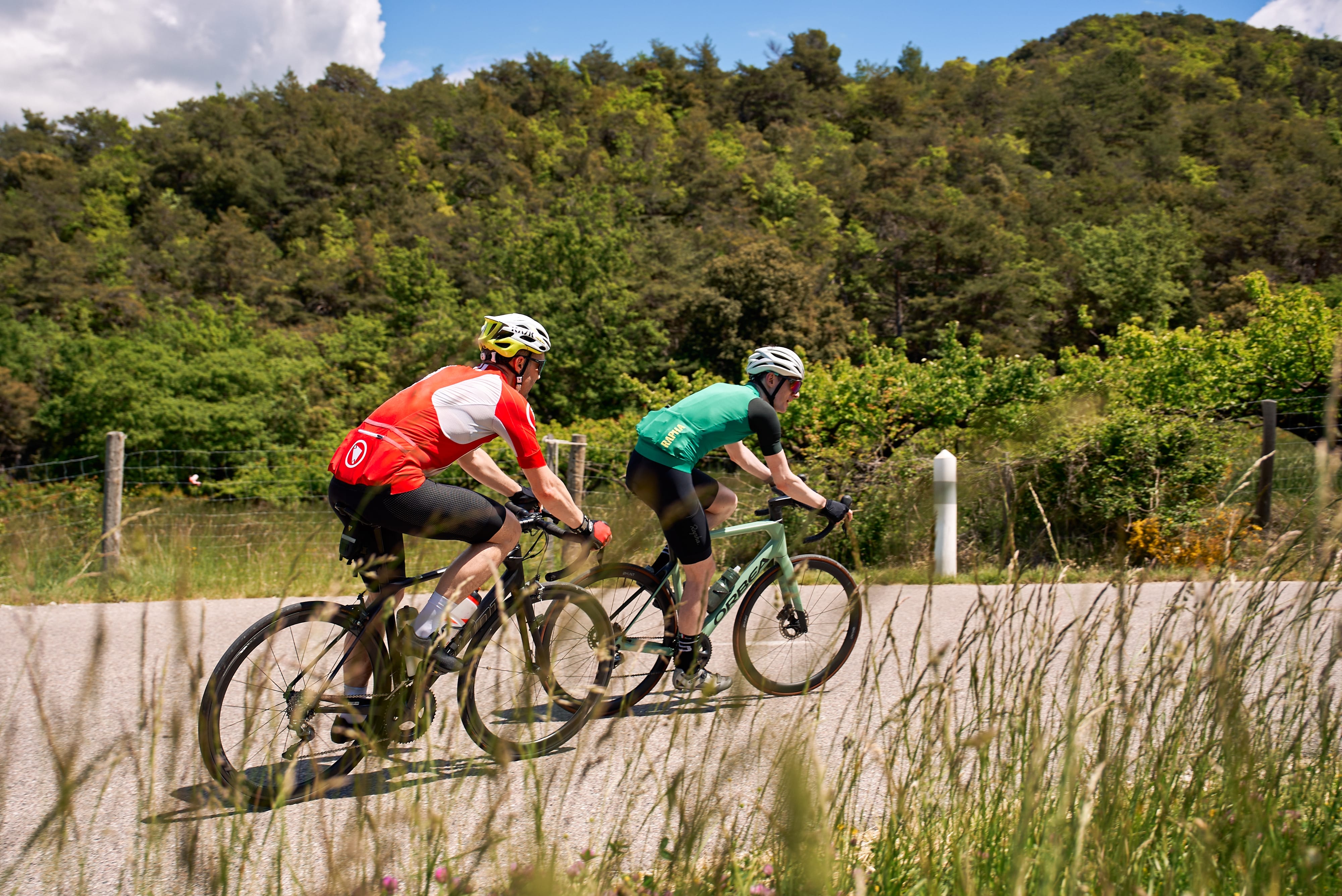 Two riders push in tandem during the Mont Ventoux Tour de France tour