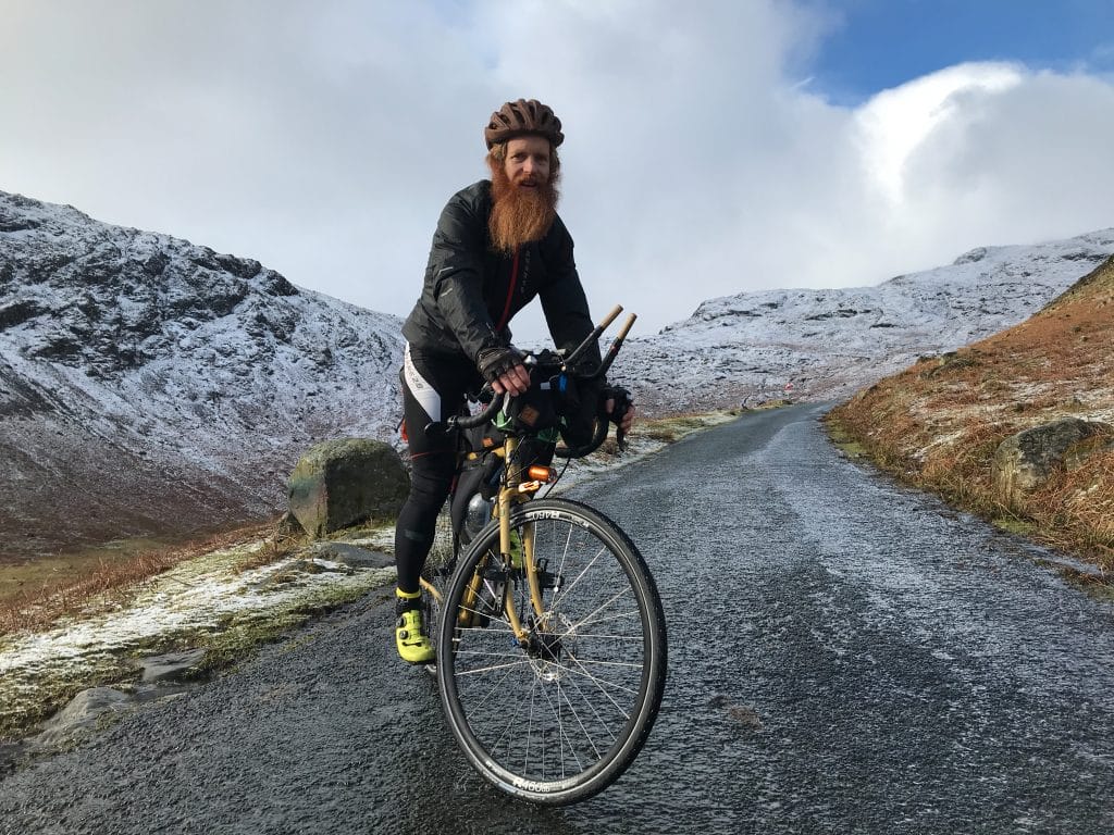 Ultra-endurance athlete Sean Conway poses with his bike