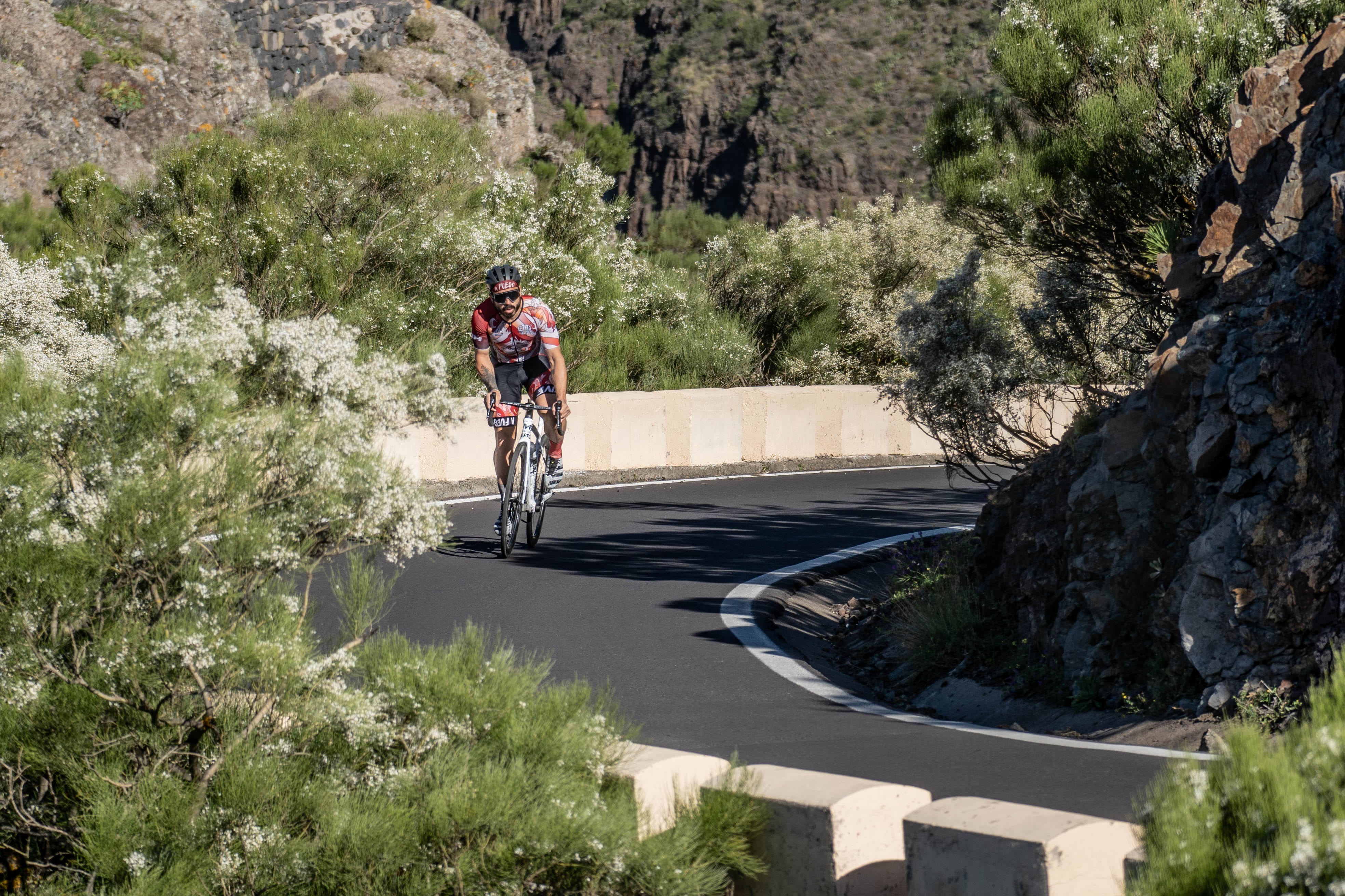 A cyclist winds his way through the hills during a cycling trip to Italy