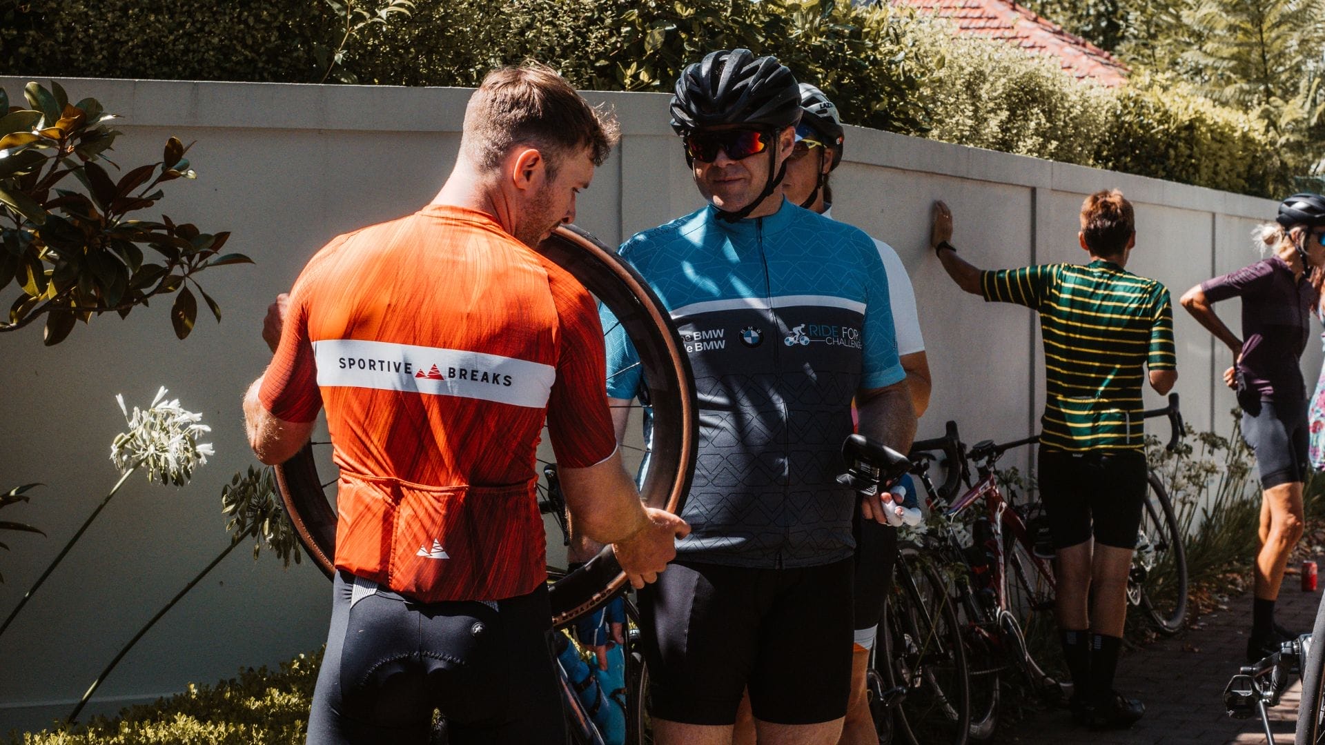 A Sportive Breaks mechanic assists riders during the Alpe d'Huez cycling trip