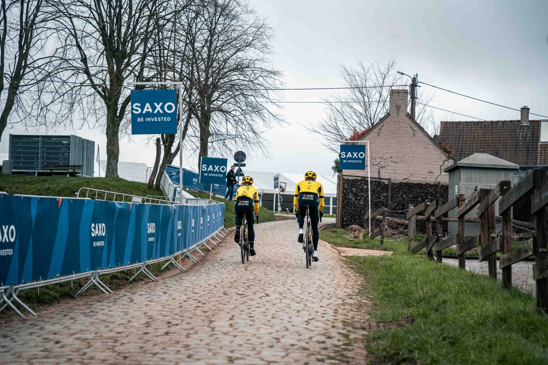 Team Visma | Lease a Bike riders passing along the cobbles during the E3 Saxo Classic 2025