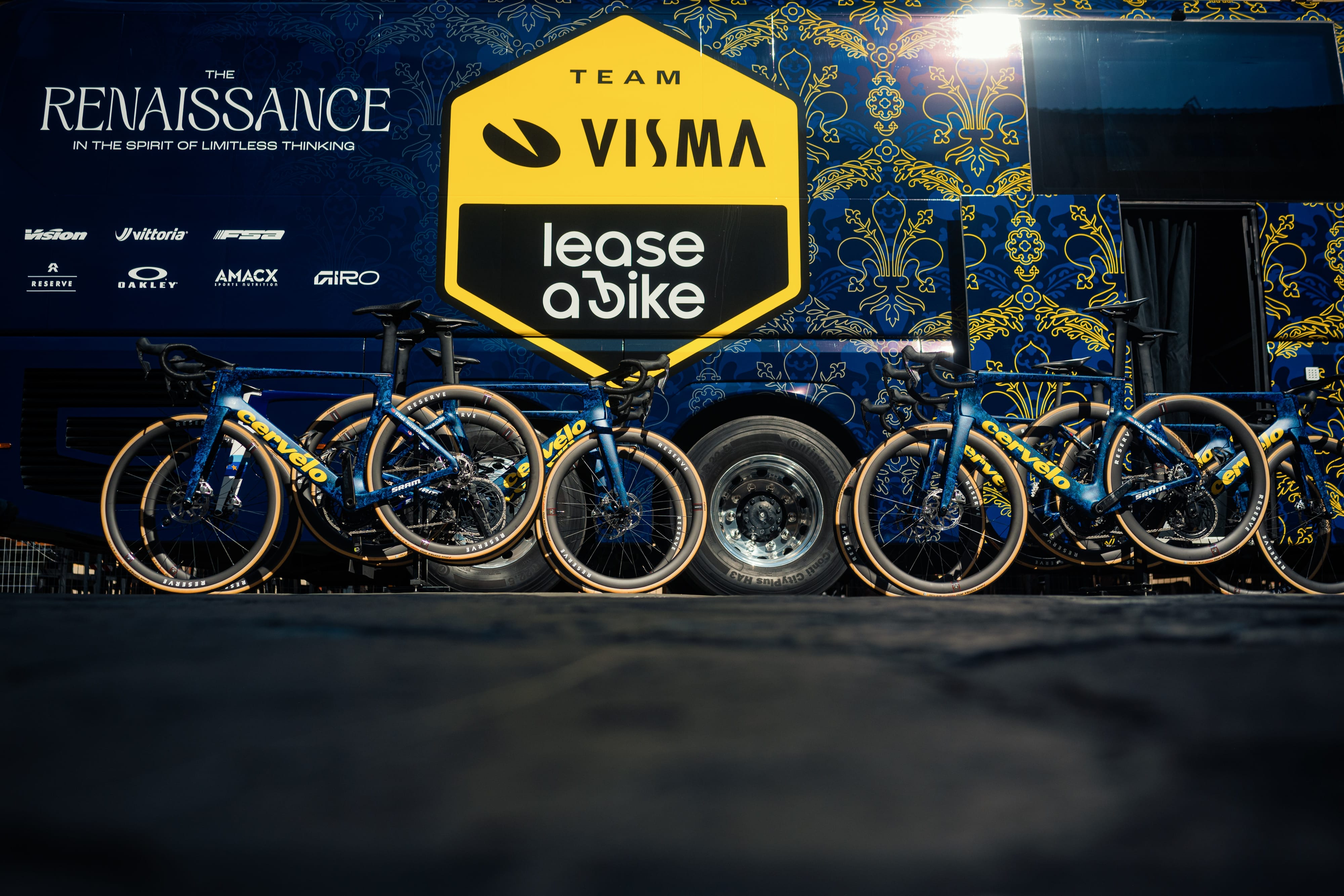 Team Visma | Lease a bike bicycles lean against the team bus ahead of the Team Visma news that the brand has partnered with Sportive Breaks