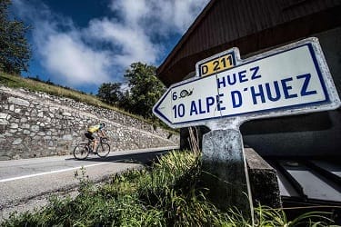 Signs for Alpe d'Huez, visible on the Alpe d'Huez cycling holidays